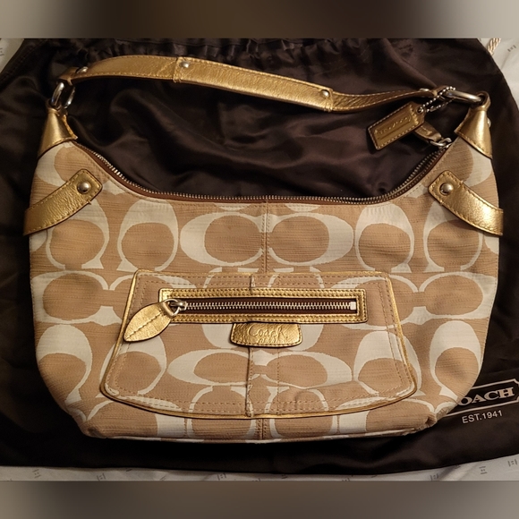 Coach Handbags - Coach Gold&White purse